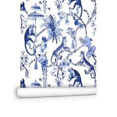 a blue and white wallpaper with animals on it