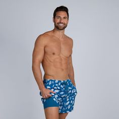 Model's height: 183cm/6'0", Model is wearing: Medium Collins is our premier and most iconic swim short. The Built-in liner is super soft, supportive and 100% chafe-free. No more mesh, just comfort. Available in Shirt- Autumn Blue