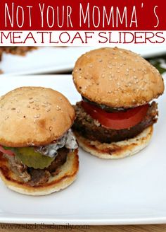 two hamburgers sitting on top of a white plate with the words, not your momma's meatloaf sliders