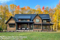 this is an image of a beautiful house in the fall with leaves on the trees