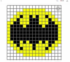 a cross stitch pattern with black and yellow squares in the shape of a smiley face