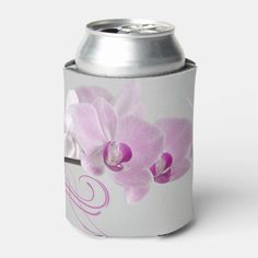 a can cooler with pink orchids on it