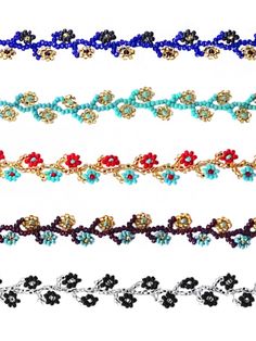 several different colored beaded bracelets on a white background