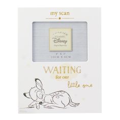 the packaging for disney's winnie the pooh book is shown in white and gold