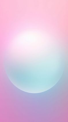 a blurry background with an oval shaped object in the center and light blue, pink, and white colors