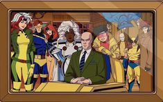 an image of a man sitting in front of a group of superheros on a desk