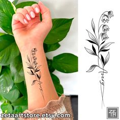 a woman's arm with a flower tattoo on it