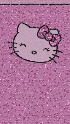 the hello kitty wallpaper is pink and has a bow on it's head