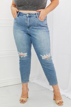 These jeans offer a unique blend of ruggedness and elegance, perfect for any fashion-forward individual looking to make a statement.The light wash gives them a casual, laid-back feel, while the distressed detailing adds a touch of edginess and attitude. And the rhinestone embellishments along the top provide just the r Corset Costumes, Rhinestone Jeans, Reading Shirts, Rhinestone Embellishments, Blue Fits, Judy Blue Jeans, Jeans Online, Plaid Shorts, Western Shirts