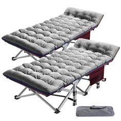 three folding beds with mattresses on them