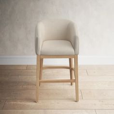 a white chair sitting on top of a hard wood floor