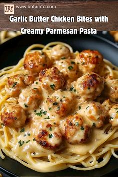 garlic butter chicken bites with creamy parmesan pasta on a black plate and text overlay that reads garlic butter chicken bites with creamy parmesan pasta