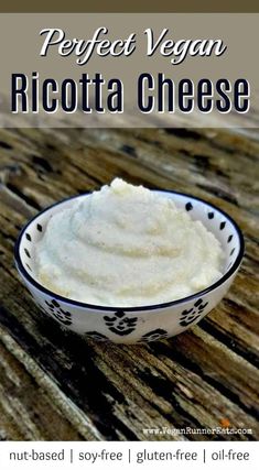 a bowl filled with ricotta cheese on top of a wooden table