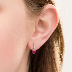 She'll be enamored at the sight of these darling drop earrings. Fashioned in sterling silver, this adorable look showcases a 5.0mm heart-shaped lab-created bright red ruby beneath a white sapphire-lined linear post. Buffed to a brilliant luster, these post earrings secure comfortably with friction backs. This ring is custom-made to fit your ring size. Sterling silver rings cannot be resized after purchase. Zales Jewelry Earrings, Peoples Jewellers, Ruby Stone, Sapphire Stone, Red Ruby, Stone Heart, Red Stone, White Sapphire, Earring Backs