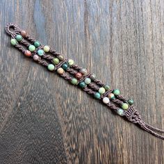 This triple spiral Micromacrame bracelet was handmade by me using Brazilian waxed cord and agate beads. Micromacrame Bracelet, Triple Spiral, Bracelet Macrame, Macrame Jewelry, Braided Bracelets, Agate Beads, Arm Band, Beaded Bracelet, Friendship Bracelets