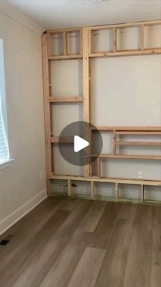 an empty room with some shelves in it