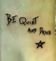 a tattoo saying be quiet and drive with stars on it