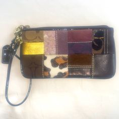 Nwot Coach Holiday Patchwork Suede Brown Leather Wristlet Multicolor Rectangular Wristlet With Strap, Multicolor Rectangular Wristlet With Wrist Strap, Coach Rectangular Leather Wristlet, Coach Leather Rectangular Wristlet, Coach Multicolor Wristlet, Multicolor Coach Wristlet For Daily Use, Coach Multicolor Pouch Wristlet, Coach Multicolor Wristlet For Everyday, Coach Clutch