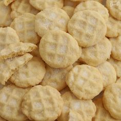 a pile of cookies that are sitting on a table