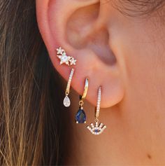 These Gold Blue Sapphire Pear Drop Earring feature blue sapphire set in 14KT Yellow Gold. Hoop measures 8mm Sold as a single Gold 1.36 grams Sapphire 0.94 cts Evil Eye Blue, Eye Drop, Diamond Evil Eye, Sapphire Earrings, Drop Earring, 14kt Gold, Evil Eye, Blue Sapphire, Gold Diamond