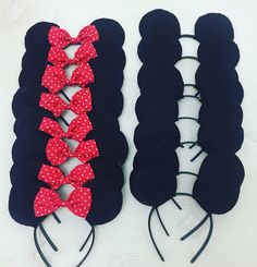 three minnie mouse ears with red bows and polka dot hair ties on top of each other