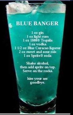 a tall glass filled with blue and green liquid