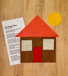 a piece of paper that has been cut out to look like a house