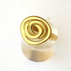 This is a very unique handmade 18K gold ring. It reminds me of a rose and the free link in the middle has a movement adding dynamics to the rose. The ring is from the Zen Nature collection. Size: 8 and 6.5 in stock. other sizes available upon request. Metal: 18K solid gold The ring will be shipped elegantly gift wrapped and in a padded envelope. To see more rings click here: https://www.etsy.com/shop/RuthaJewelry?section_id=6544457 Visit my shop here: https://www.etsy.com/shop/RuthaJewelry Modern Gold Spiral Ring, Gold Spiral Rings For Anniversary, Modern Yellow Gold Spiral Ring, Modern Spiral Yellow Gold Ring, Zen Nature, Link Ring, Handmade Gold Jewellery, The Zen, Gold Statement Ring