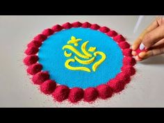 someone is making a decorative item out of felt