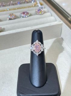 This 1 Carat Oval is a beautiful and feminine piece of jewelry that exudes grace and sophistication. The oval cut adds an elongated and elegant look to the ring, while the pink color adds a touch of romance. Pink diamonds are rare and highly coveted, making this ring a unique and valuable addition to any jewelry collection. Ring Details: 1.00 Carat Very Light Pink Oval SI2 Clarity Set in 18k White & Rose Gold Set with an additional 1.65 carats of side white and pink diamonds. Size 6 Rare Colors, Pink Diamonds, Oval Diamond Ring, Pink Diamond, White Rose Gold, Gold Set, Oval Diamond, 1 Carat, The Pink