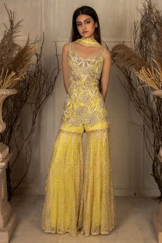 Buy Yellow and gold embellished sharara set -Designer Wear - Ensemble Designer Heavy Suits, Haldi Sharara Outfits, Haldi Sharara, Haldi Outfits For Bridesmaid, Yellow Suit Indian, Golden Sharara, Pak Suits, Yellow Sharara Set