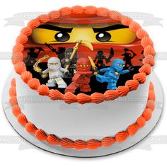 the angry birds cake is decorated with orange frosting