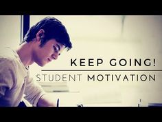 a man sitting at a desk writing on a piece of paper with the words keep going student motivation