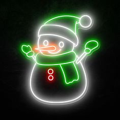 a neon sign with a snowman on it's face and arms, in the dark