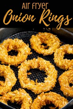 air fryer onion rings are cooking on the grill with text overlay that reads, air fryer onion rings