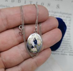 A genuine vintage Blessed Virgin Mary medal, antique enamel Catholic charm, petite religious catholic holy charm with inscription in German, very nicely done, in good vintage condition, ideal for necklace, would make a nice gift for someone special! Floats from a 16 inch long vintage 925 silver chain! Material: solid silver, porcelain Weight: 3.4g Measures: approx. 25 x 17 mm (1 x 0.6 inch) PLEASE LOOK AT THE PICTURES, THEY ARE PART OF THE DESCRIPTION AND ARE THE ACTUAL ITEM YOU WILL RECEIVE. AL Antique Enamel Necklace With Hallmark, Antique Enamel Necklace Hallmarked, Antique Enamel Hallmarked Necklaces, Antique Engraved Enamel Necklace, Antique Oval Enamel Necklaces, Antique Oval Enamel Necklace, Enamel Medallion Necklace With Hallmark, Vintage Enamel Jewelry For Collectors, Vintage Enamel Collectible Jewelry