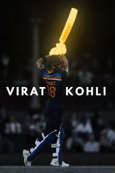 a man holding a bat over his head with the words virat kohl on it