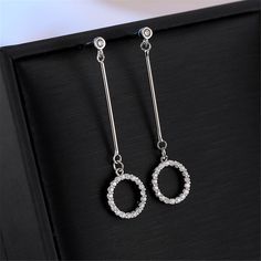 Add an instant touch of elegance to your ensemble with these dazzling cubic zirconia and sterling silver-plated drop earrings. 0.51 " W x 1.93 " L Silver-plated copper?/ cubic zirconia Silver Plate, Cubic Zirconia, Silver Necklace, Copper, Plating, Drop Earrings, Sterling Silver, Silver