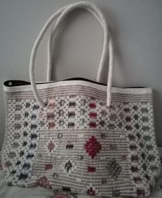 Handmade hemp handbag / arm bag. Closable with zipper. Three sizes, small, medium, large. Its main material is hemp, it also contains cotton, and there is also small polyester embroiders. Hand/arm/shoulder bag. For both women & men. Because it is not mass production, patterns may change by product. White Woven Shoulder Beach Bag, White Bohemian Handheld Shoulder Bag, Woven Cotton Shoulder Bag For Market, Embroidered Beige Beach Bag For Daily Use, Cotton Woven Shoulder Bag For Market, Market Cotton Woven Shoulder Bag, White Handmade Bohemian Canvas Bag, White Bohemian Handheld Bag, Casual Beige Fair Trade Shoulder Bag