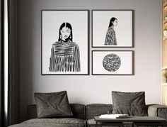 three black and white pictures hang on the wall above a couch