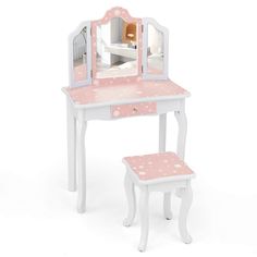 a doll's dressing table and stool with a mirror on the top one side