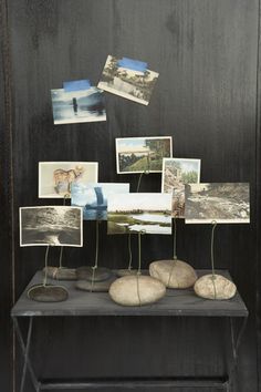 some rocks and pictures on a table