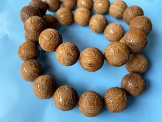 Material: Natural Sandalwood (Natural Wood, Fragrance Free ) Size: 16 mm Hole: 1.5 mm QTY: 14-15 beads Wooden Beads For Jewelry Making, Wooden Round Beads For Jewelry Making, Round Wooden Beads For Jewelry Making, Large Oval Spiritual Beads, Healing Wooden Round Bead Jewelry, Healing Wooden Beaded Jewelry, Healing Wooden Beads Jewelry, Healing Jewelry With Round Wooden Beads, Traditional Round Wooden Beaded Bracelets