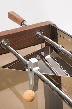 A close up detail of the Derby Wood which is a modern luxury foosball table made by Impatia in Italy. The table features a bronze glass playing field Foose Ball Table, Modern Foosball Table, Foosball Table Design, Mini Foosball Table, Outdoor Foosball Table, Black Foosball Table, Door Slide, Play Zone