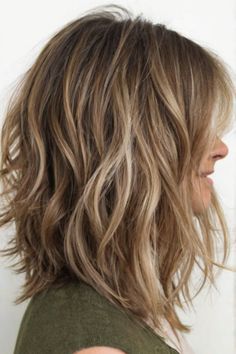 Discover the transformative power of Layered Haircuts for Medium Length Hair!Unveil your next hairstyle with these 30 stunning options and see how layers can elevate your look. Click to read more and follow us for endless inspiration! Med Hair Cuts With Layers, Dramatic Layers Short Hair, Mid Length Messy Hair, Medium Hair With Choppy Layers, Medium Fine Hair With Layers, Longer Layers Medium Hair, Medium Hair With Lots Of Layers, Long Layered Medium Length Hair, Angled Lob Haircut Mid Length