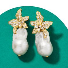 Ross-Simons - Italian 13-18mm Cultured Baroque Pearl, 1.80ct t. w. Cubic Zirconia Flower Earrings Over. Crafted in Italy, these flourishing flower earrings feature 13-18mm cultured freshwater baroque pearls and 1.80 ct. t. w. marquise and round brilliant-cut CZs in polished 18kt yellow gold over sterling silver. Hanging length is 1 3/8". Post/clutch, CZ and white pearl flower earrings. CZ weights are diamond equivalents. Pearls are unique and may vary. Pearl birthstones are the perfect gift for Baroque Pearl And Diamond Earrings, Pearl Flower Earrings, Pearl Birthstone, Baroque Pearl Earrings, Pearl And Diamond Earrings, Fine Jewelery, Pearl Flower, Accessories Jewelry Earrings, Baroque Pearls