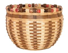 a woven basket with red and brown beads in it