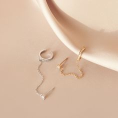 E A R * C U F F * C H A I N * E A R R I N G S * Material: High Quality Solid 925 Sterling Silver * Finish: Sterling Silver ∙ 18K Gold ∙ Rose Gold * Featuring 1.5mm CZ Diamond, connected by Chain with Minimalist Pave Cuff. H O W ∙ T O ∙ O R D E R * Select your finish in the drop down menu. Design is available in 3 colors: 18k Gold, Sterling Silver, and Rose Gold. O T H E R ∙ I N F O R M A T I O N * All items are nicely packaged ready to gift in elegant jewelry boxes. * If you can't find the infor Ear Cuff Chain Earrings, Cuff Chain Earrings, Caitlyn Minimalist, Pave Ear Cuff, Earring Cuff Chain, Ear Cuff Chain, Cartilage Ear Cuff, Wrap Earrings, Ear Cuff Earings