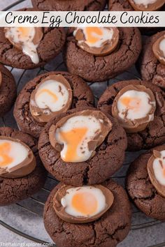 chocolate cookies with eggs in the middle on a wire cooling rack, ready to be eaten