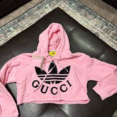 Brand New Gucci Cropped Sweatshirt. Size Xl Runs A Bit Small. Absolutely Adorable Thicker Material Pink Logo Print Hoodie For Spring, Pink Athleisure Sweatshirt With Logo Print, Pink Logo Print Athleisure Sweatshirt, Pink Logo Print Sweatshirt In Athleisure Style, Casual Pink Sweatshirt With Logo Print, Pink Logo Print Top For Winter, Casual Pink Hoodie With Logo Print, Pink Tops With Logo Print For Winter, Winter Pink Tops With Logo Print